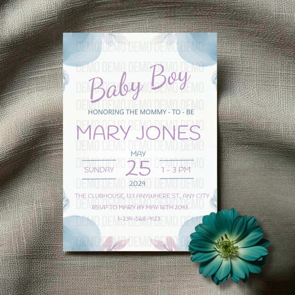 Baby shower invitation card for a baby boy with floral design on a textured fabric background.