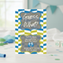 Baby shower invitation with blue and green stripes and text about a baby boy's arrival.