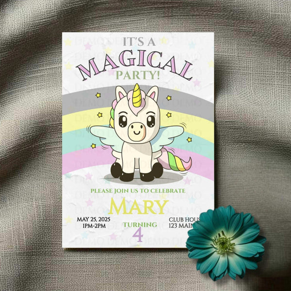 Invitation card with a unicorn design on a textured surface with a flower.