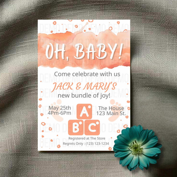 Baby shower invitation with 'OH, BABY!' text and floral design on a textured fabric background.