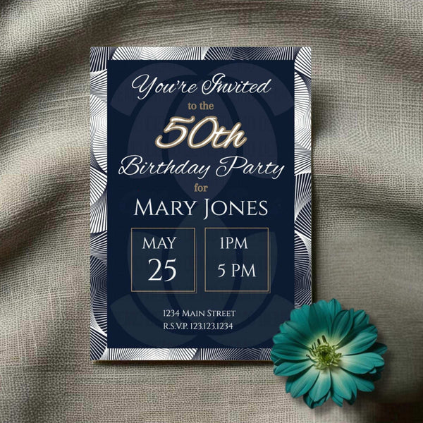 50th birthday party invitation with gold text on a dark blue background, placed on a textured surface with a teal flower.