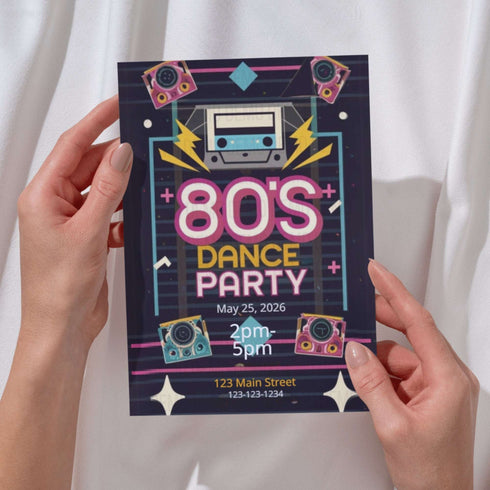 Hands holding a '80s Dance Party' flyer with retro design elements.