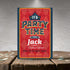 Party invitation card for 'It's Party Time for Jack' on a wooden surface with a textured gray background.