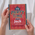 Person holding a party invitation card with 'It's Party Time for Jack' text.