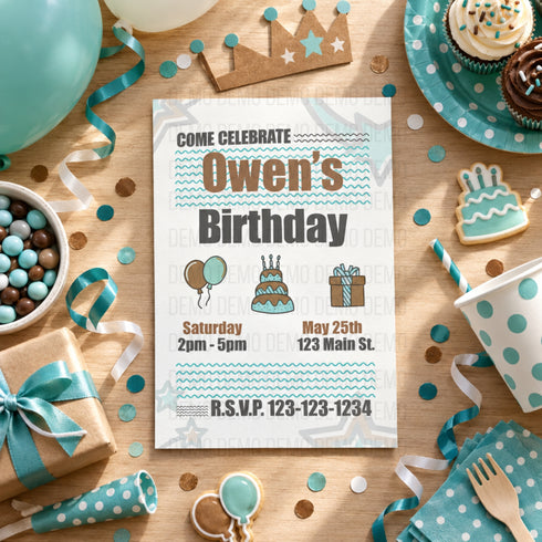 A birthday invitation card styled on a wooden table with party decorations including balloons, cupcakes, confetti, a crown, and gift boxes. The card reads 'Come Celebrate Owen's Birthday' with event details.