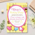 Birthday party invitation with colorful design on a light surface with flowers and leaves.