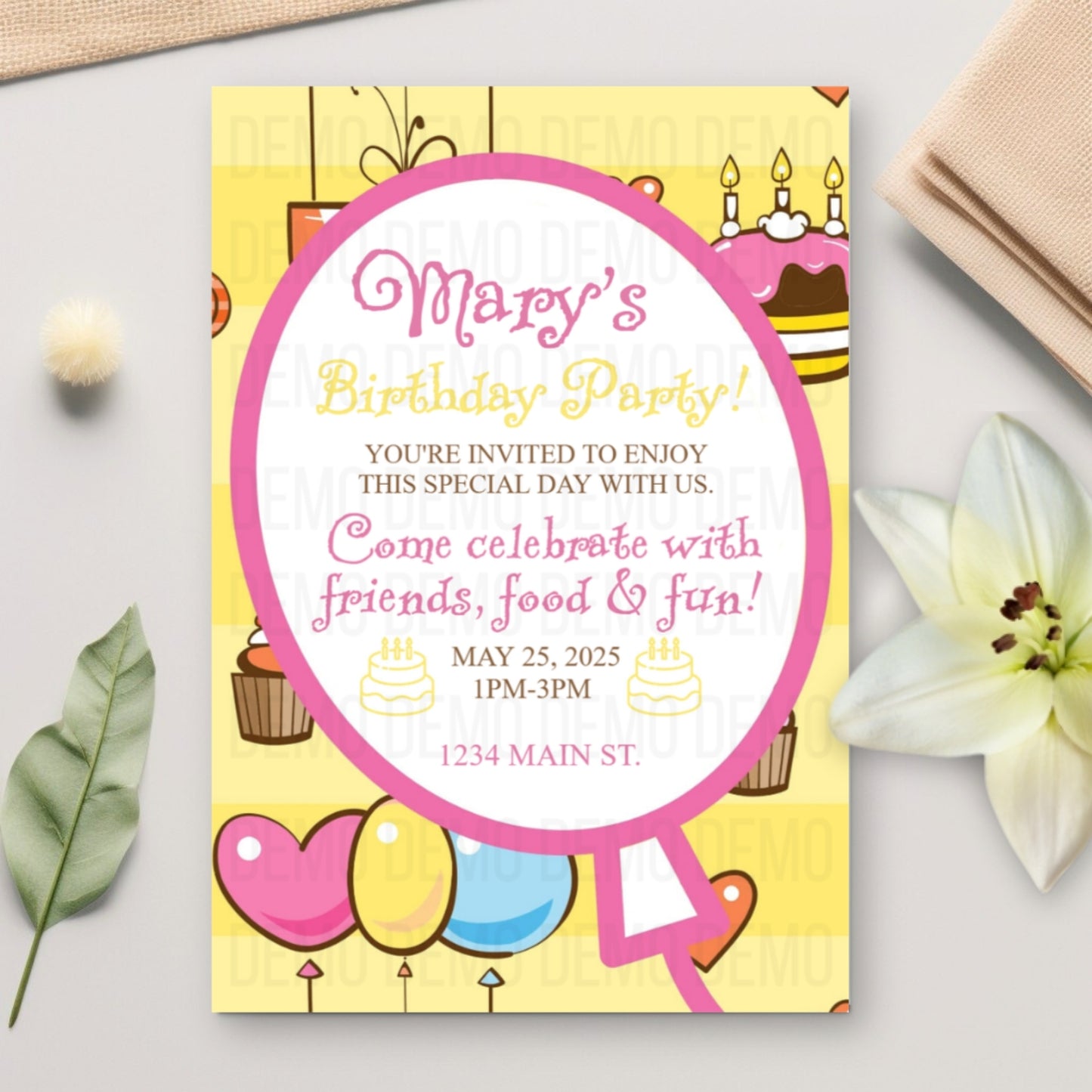 Birthday party invitation with colorful design on a light surface with flowers and leaves.
