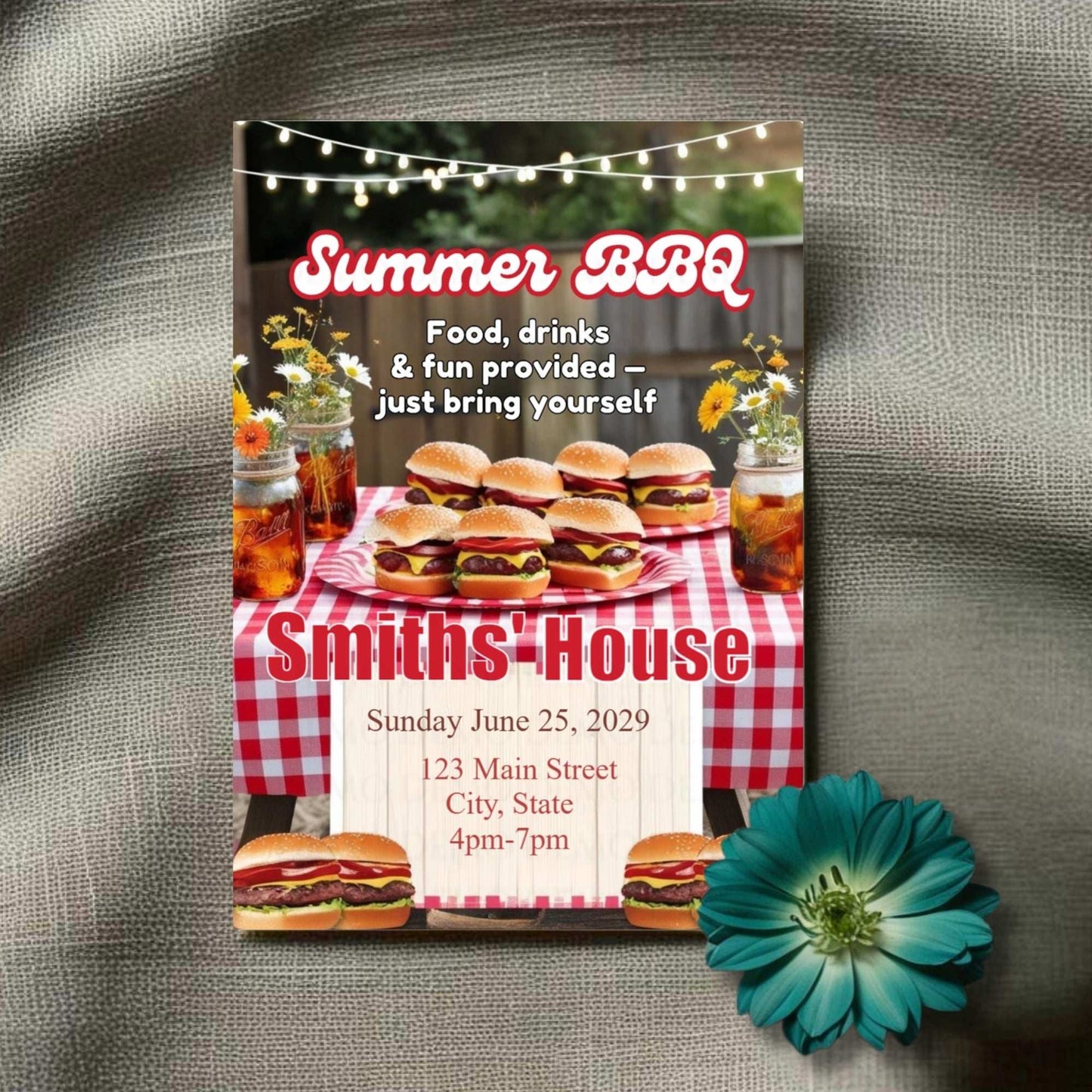 Summer BBQ invitation with hamburgers, beer, and flowers on a checkered tablecloth.