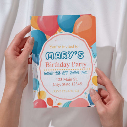 Birthday party invitation with colorful balloons held by a person against a white background