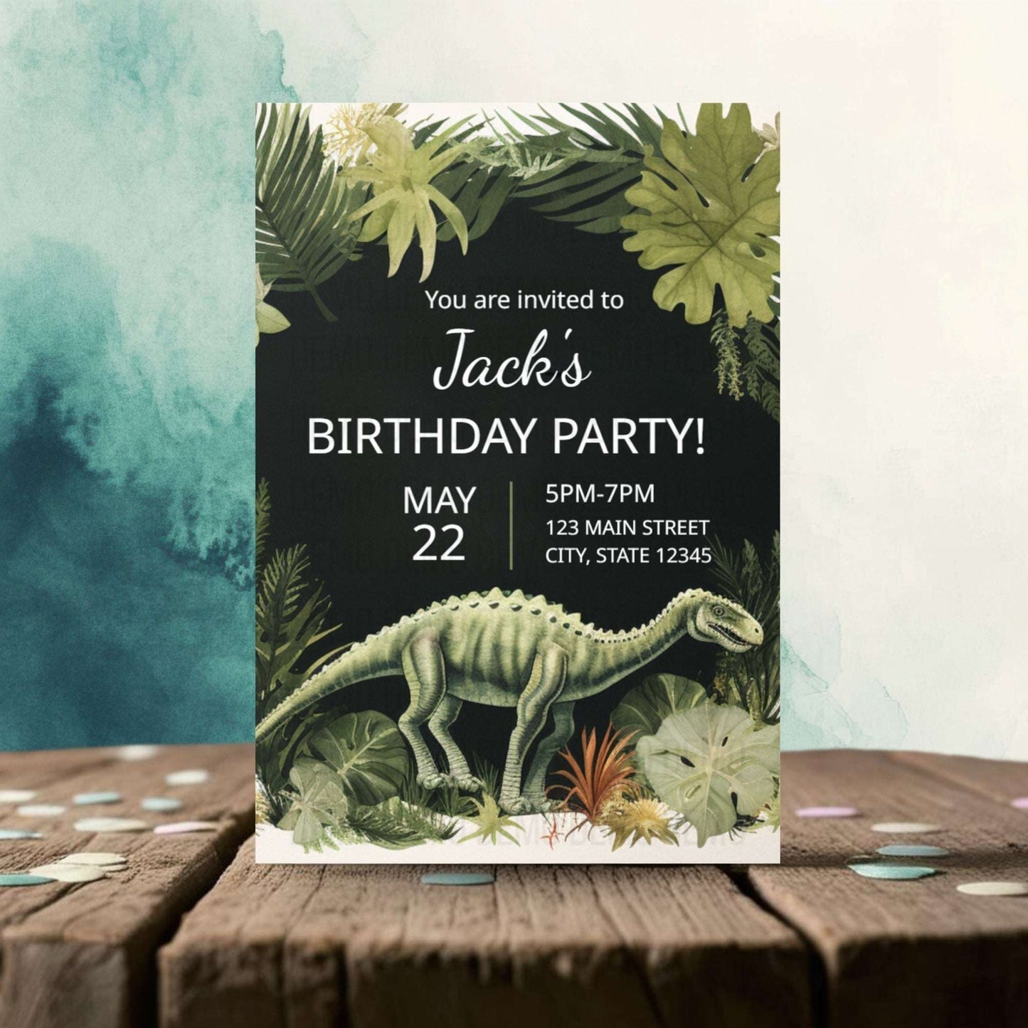 Birthday party invitation with dinosaur and foliage design on a wooden surface