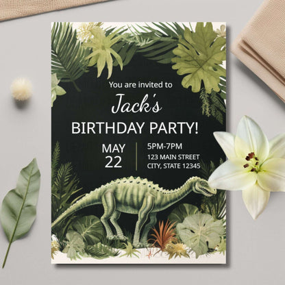 Birthday party invitation with dinosaur and foliage design on a gray surface with flowers.