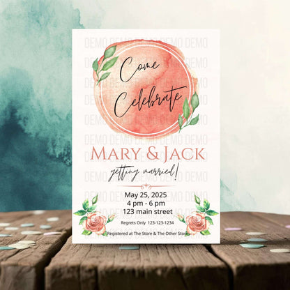 Wedding invitation card with floral design on a wooden surface