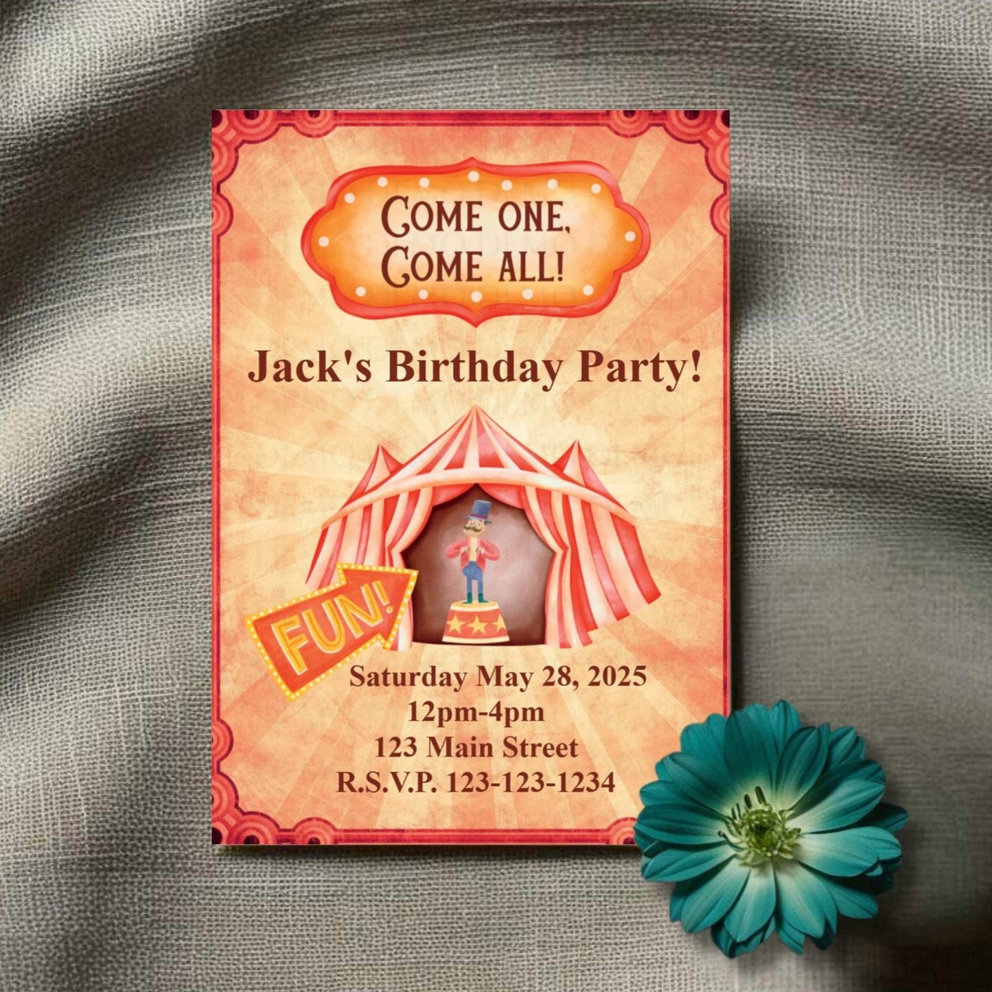 Birthday party invitation with a circus theme on a textured surface with a flower.