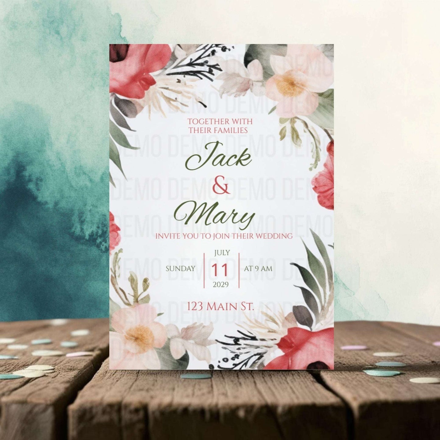Wedding invitation card with floral design on a wooden surface