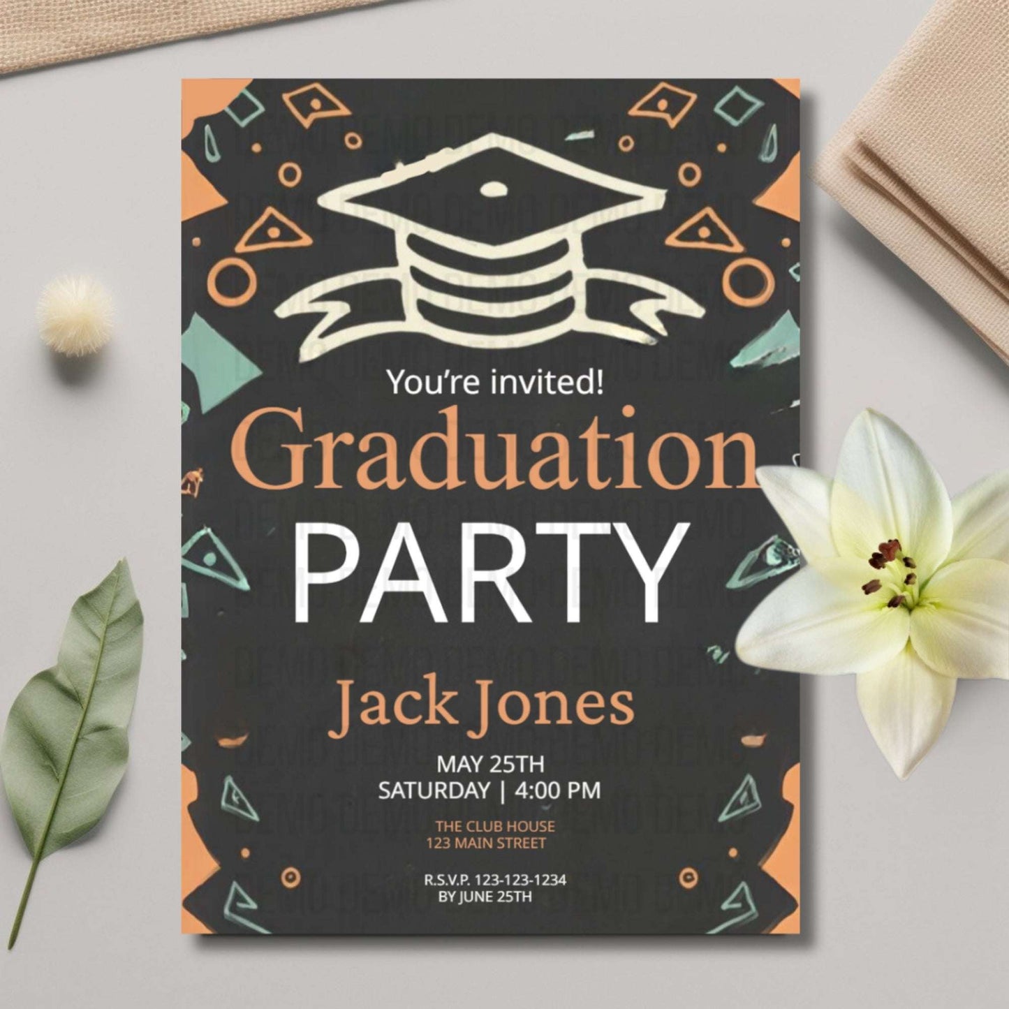 Graduation party invitation with decorative elements on a light surface.