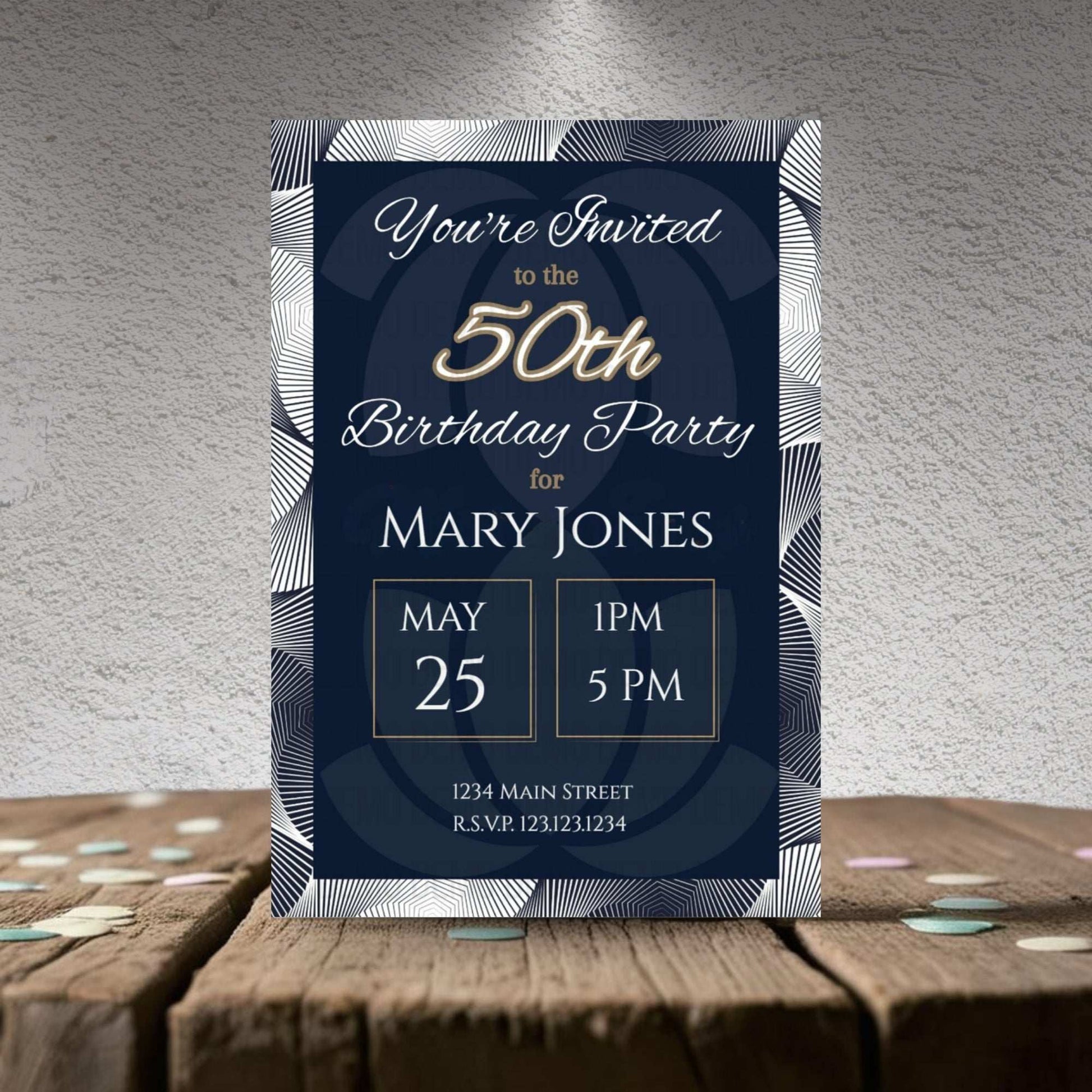 Navy blue birthday party invitation with gold text on a textured surface