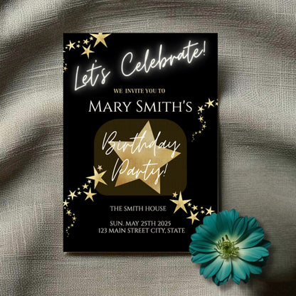 Birthday party invitation with gold star design on a textured surface with a blue flower.