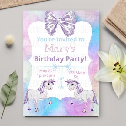 Birthday party invitation with unicorns and a bow on a colorful background