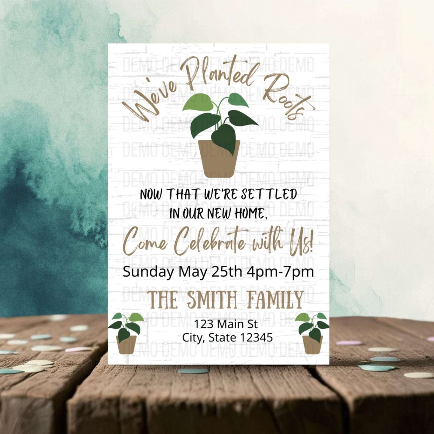 Plant-themed party invitation on a wooden surface with a watercolor background