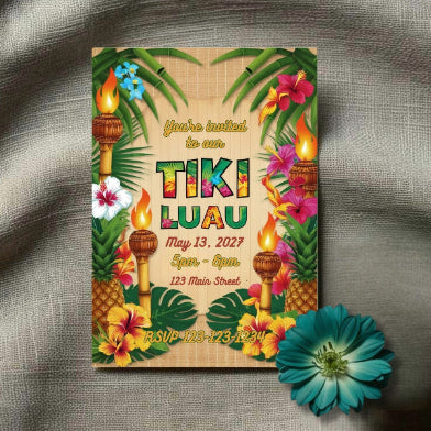 Tiki Luau invitation with tropical elements on a textured surface.
