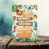 Children's birthday party invitation with monkey and jungle theme on a wooden surface.